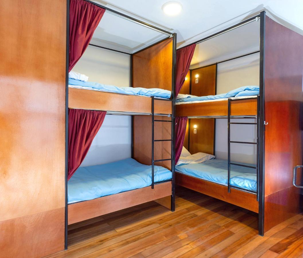 Cama en habitación compartida mixta de 4 camas